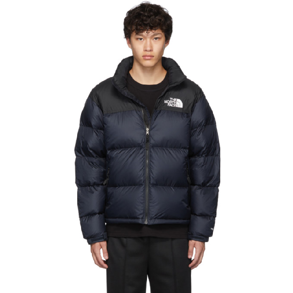 navy north face puffer jacket