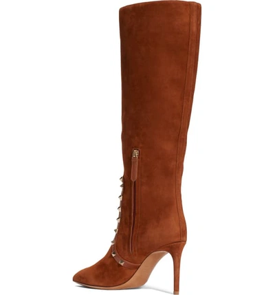 Shop Valentino Rockstud Knee High Pointed Toe Boot In Brown Suede