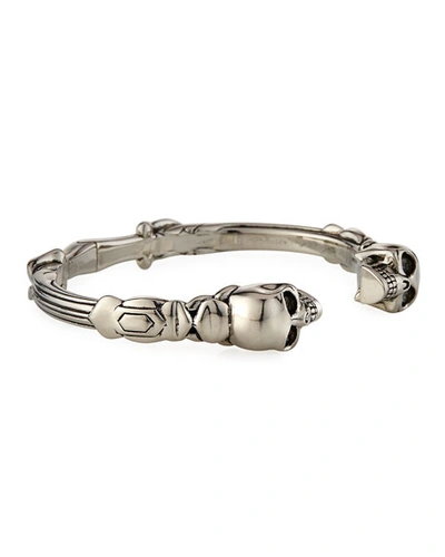 Shop Alexander Mcqueen Men's Textured Twin Skulls Cuff Bracelet In Silver