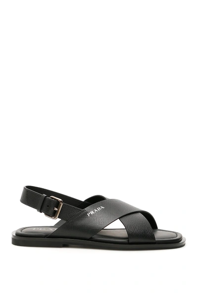 Shop Prada Criss-crossing Sandals In Nero (black)