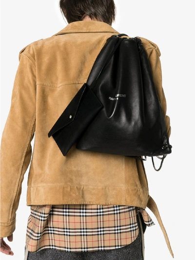 Shop Saint Laurent Logo Print Drawstring Leather Backpack