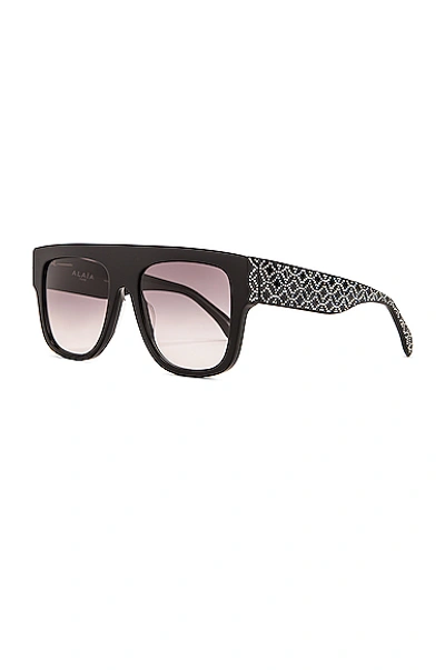 Shop Alaïa Flat Top Stud Sunglasses In Black & Silver