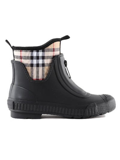 Shop Burberry Checked Rain Boots In Black