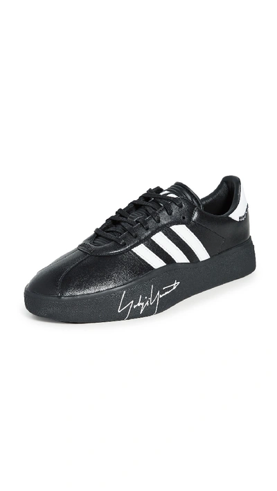 Shop Y-3 Tangutsu Football Sneakers In Black/white/black