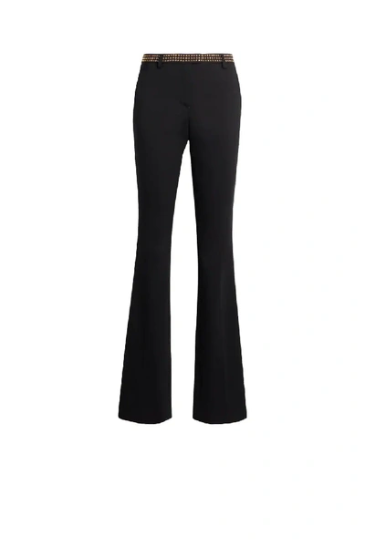 Shop Roberto Cavalli Studded Flared Trousers In Black