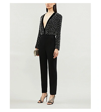 Shop Givenchy Plunge V-neck Relaxed-fit Wool And Silk-blend Jumpsuit In Black