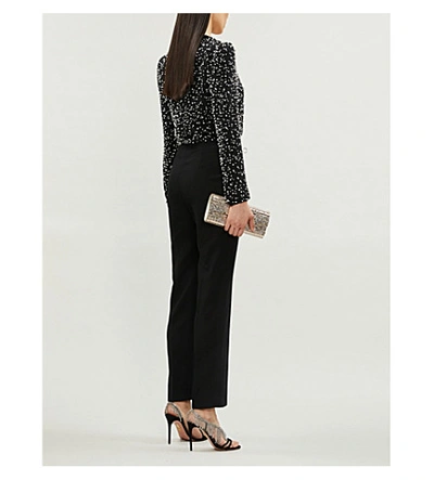 Shop Givenchy Plunge V-neck Relaxed-fit Wool And Silk-blend Jumpsuit In Black