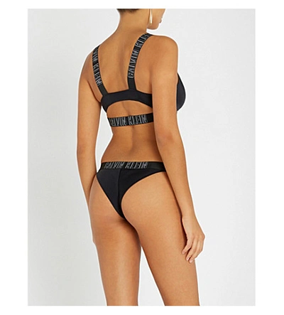 Shop Calvin Klein Logo-embossed Plunge Bikini Top In 094 Pvh Black