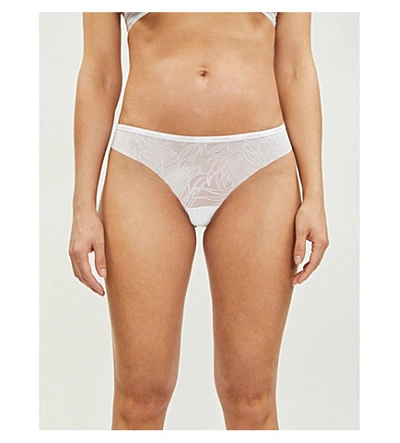 Shop Calvin Klein Sheer Marquisette Lace Thong In 100 White