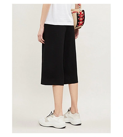 Shop Maje High-rise Woven Trousers In Black 210