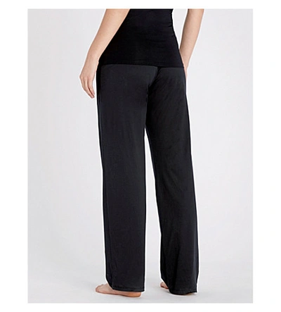 Shop Hanro Deluxe Cotton-jersey Pyjama Bottoms In Black