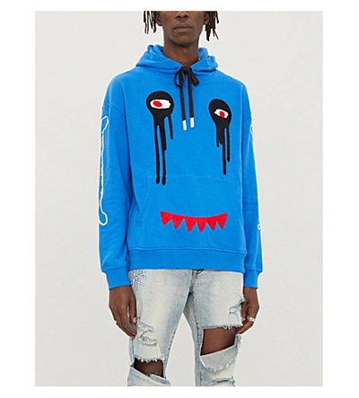 Shop Haculla Graphic-print Cotton-jersey Hoody In Blue