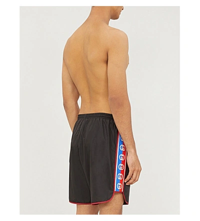 Shop Gucci Side-stripe Swim Shorts In Black