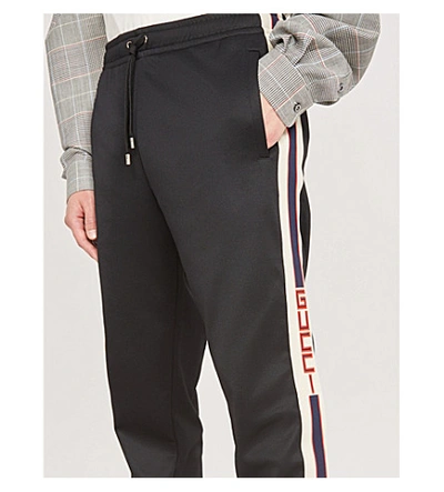 Shop Gucci Side-stripe Stretch-jersey Jogging Bottoms In Black Ivory  Red