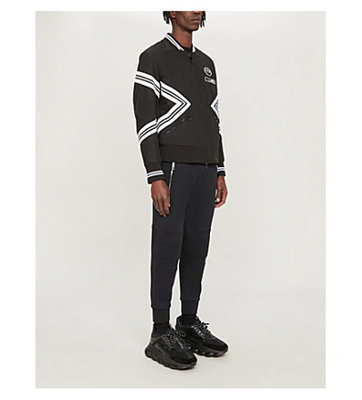 Shop Neil Barrett Panel Regular-fit Tapered Cotton-jersey Jogging Bottoms In Black Black