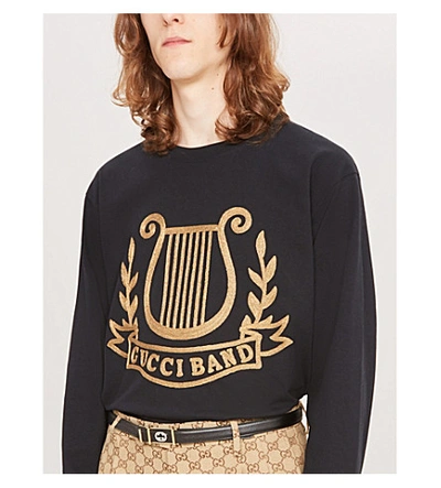 Shop Gucci Graphic-print Cotton-jersey Sweatshirt In Black Gold