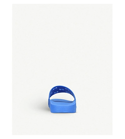 Shop Gucci Pursuit Gg Cutout Rubber Sliders In Blue