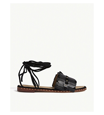 maje leather sandals decorated with studs