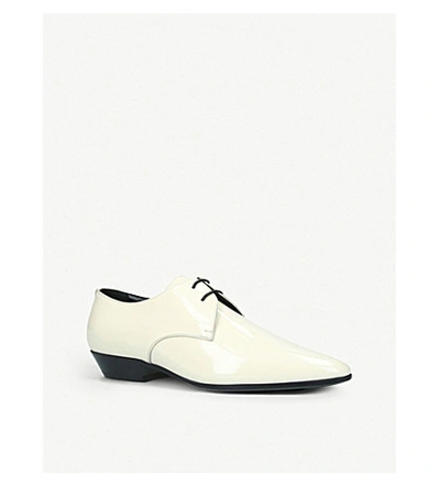 Shop Saint Laurent Jonas Patent-leather Derby Shoes In White