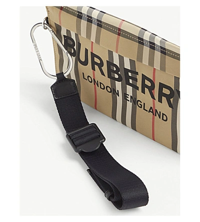 Shop Burberry Check Print Nylon Pouch Bag In Archieve Beige