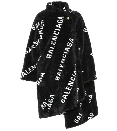 Shop Balenciaga Logo Faux Fur Coat In Black