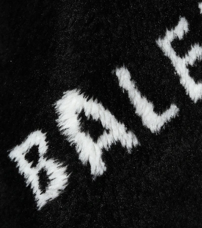 Shop Balenciaga Logo Faux Fur Coat In Black