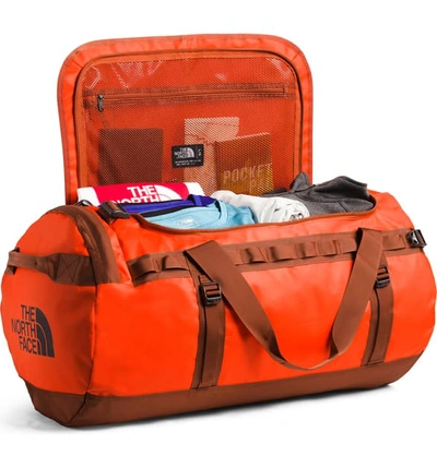 Shop The North Face Base Camp Large Duffle Bag In Acrylic Orange/ Picante Red
