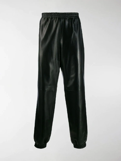 Shop Burberry Elasticated Hem Leather Trousers In Black