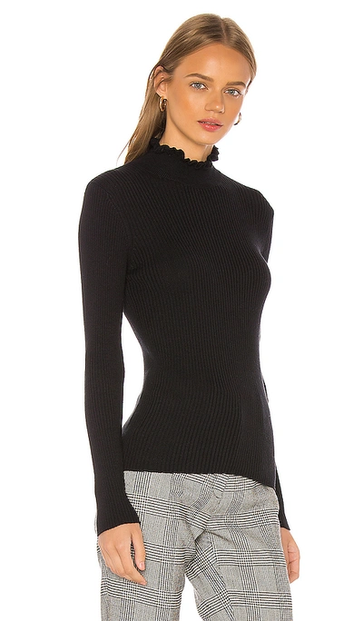 Shop Frame Turtleneck Sweater In Noir