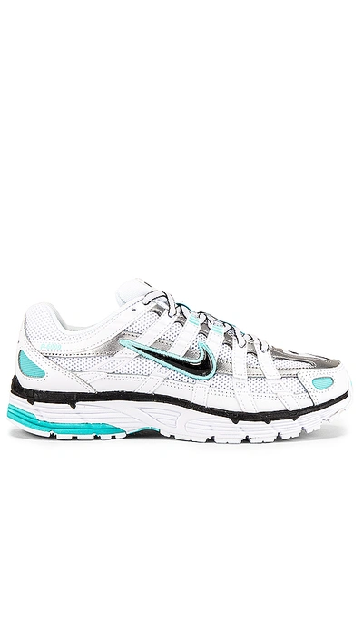 Shop Nike Women's P 6000 Sneaker In White. In White  Black  Metallic Silver & Light Aq