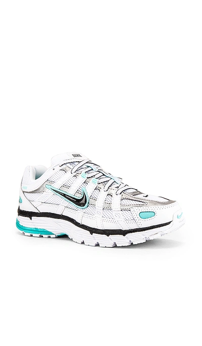 Shop Nike Women's P 6000 Sneaker In White. In White  Black  Metallic Silver & Light Aq