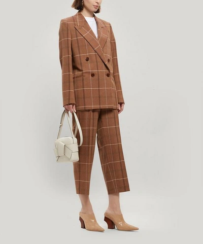 Shop Acne Studios Checked Wool-blend Tapered Trousers In Brown