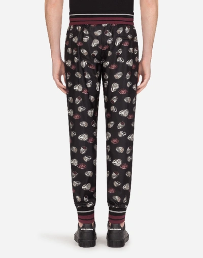 Shop Dolce & Gabbana Silk Jogging Pants With Ring Print In Black