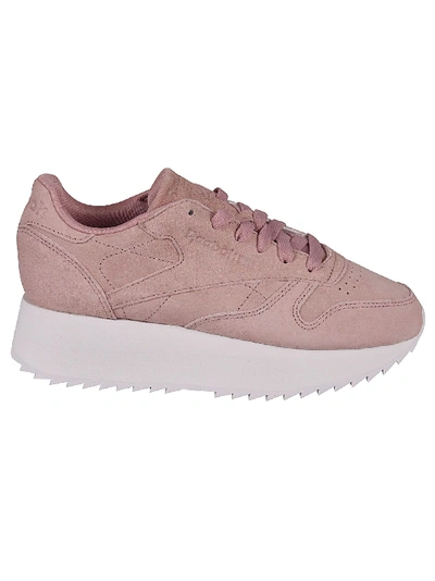 Shop Reebok Pink Suede Lace-up Shoes