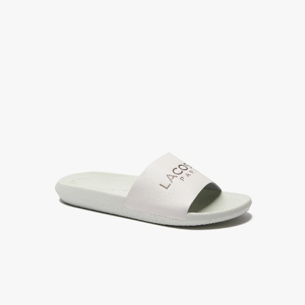white and gold lacoste slides