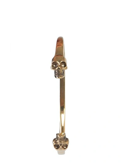 Shop Alexander Mcqueen Double Skull Bracelet In Gold