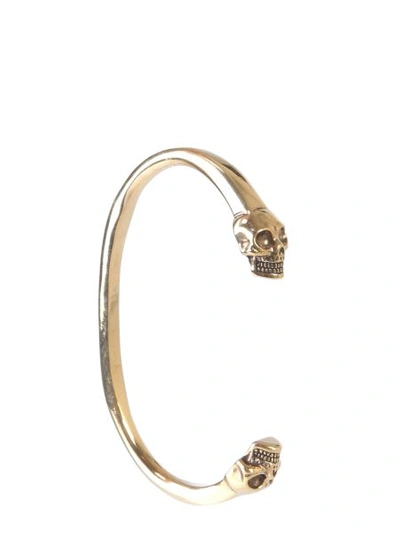 Shop Alexander Mcqueen Double Skull Bracelet In Gold