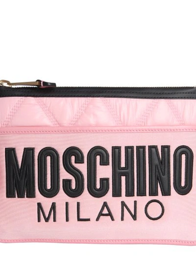 Shop Moschino Quilted Clutch In Pink