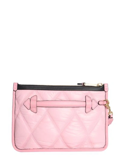 Shop Moschino Quilted Clutch In Pink