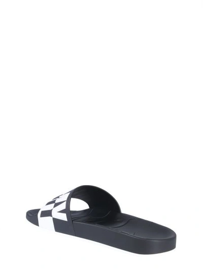 Shop Jimmy Choo Slide Jimmy Sandals In Black