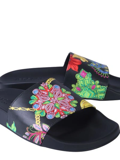 Shop Versace Slide Sandals With Gold Hibiscus Print In Black
