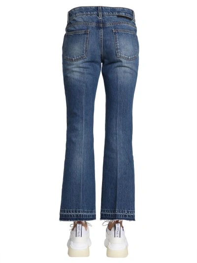 Shop Stella Mccartney Skinny Kick Jeans In Organic Cotton With Raw-cut Edges In Blue