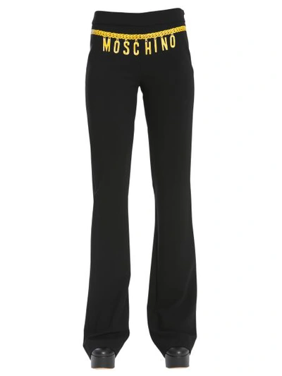Shop Moschino Chain Belt Printed Trousers In Black