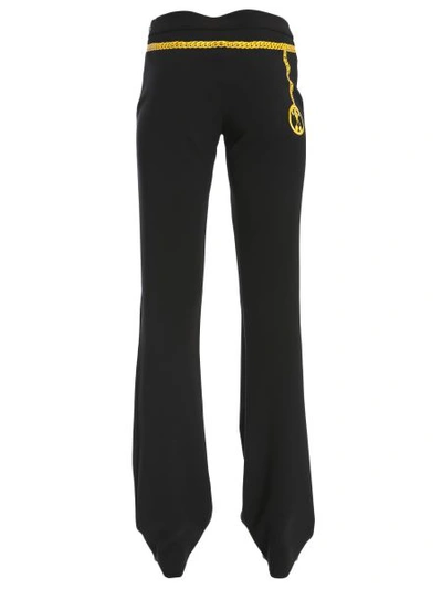Shop Moschino Chain Belt Printed Trousers In Black