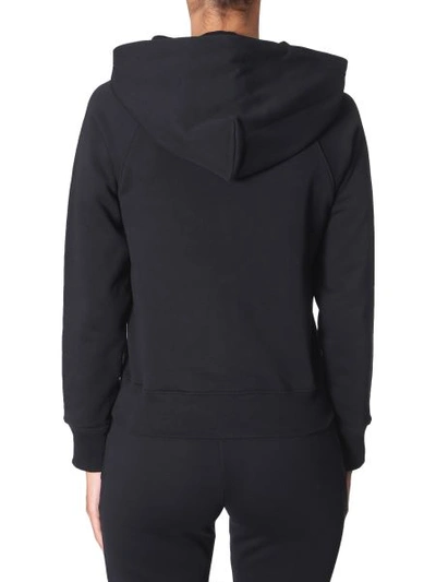 Shop Moschino Hooded Sweatshirt In Black