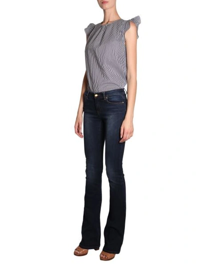 Shop Michael Michael Kors Izzy Bootcut Jeans In Blue