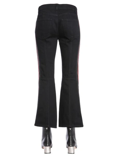 Shop Alexander Mcqueen Kickback Trousers In Black