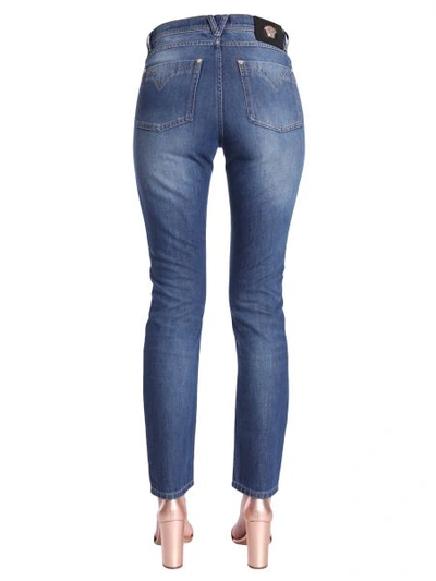Shop Versace Low Waist Skinny Fit Jeans In Blue