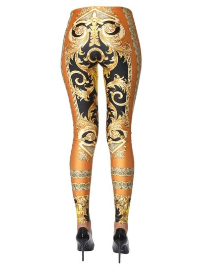 Shop Versace Printed Leggings In Multicolour