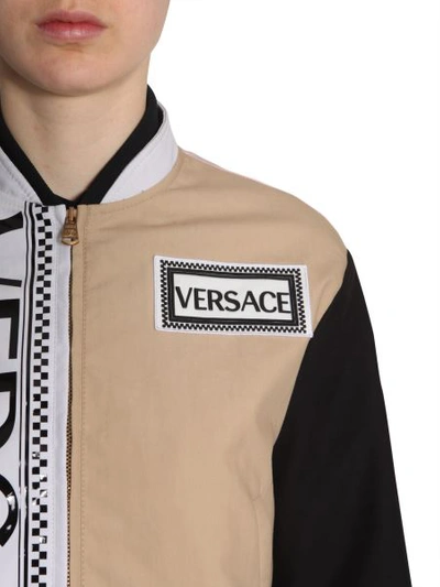 Shop Versace Bomber Jacket With Logo In Multicolour